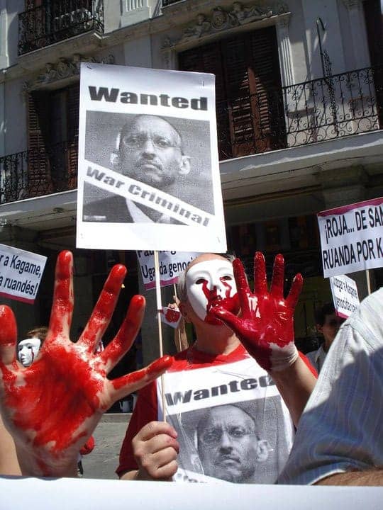 Anti-Kagame-protest-in-Spain-‘bloody’-hands-0710, Africa advocates to Obama: Don't recognize Kagame's election, World News & Views 