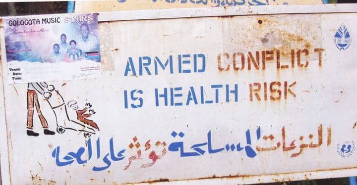 Billboard-in-Juba-South-Sudan-Armed-conflict-is-health-risk-by-Dr.-Dianne-Budd, Clarion call: VIOLENCE is a public health emergency!, News & Views World News & Views 