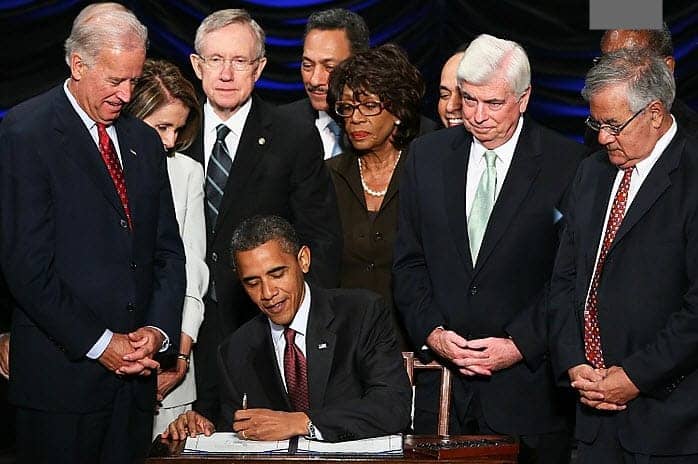 Obama-signs-Wall-Street-Reform-and-Consumer-Protection-Act-before-VP-Joe-Biden-Speaker-Nancy-Pelosi-Sen.-Maj.-Leader-Harry-Reid-Rep.-Maxine-Waters-Sen.-Chris-Dodd-Rep.-Barney-Frank-072110-by-Win-Mcnamee-Getty, Douse the firestorm, let Maxine Waters get back to the people’s business, News & Views 