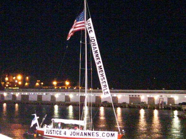 Justice-4-Johannes-banner-on-boat-in-McCovey-Cove-1016101, Longshoremen will shut down all Bay Area ports Saturday to win justice for Oscar Grant, Local News & Views 