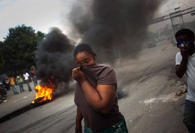 Haiti-anti-cholera-protest-PaP-111510-by-Emilio-Morenatti-AP, Haitian elections neither free nor fair, World News & Views 