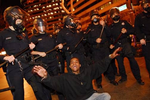 Oscar-Grant-rebellion-white-cops-Black-protester-010709-by-Jay-Finneburgh-IndyBay-web, The coming Mehserle sentencing: Redrawing the line on ‘outside agitators’, News & Views 