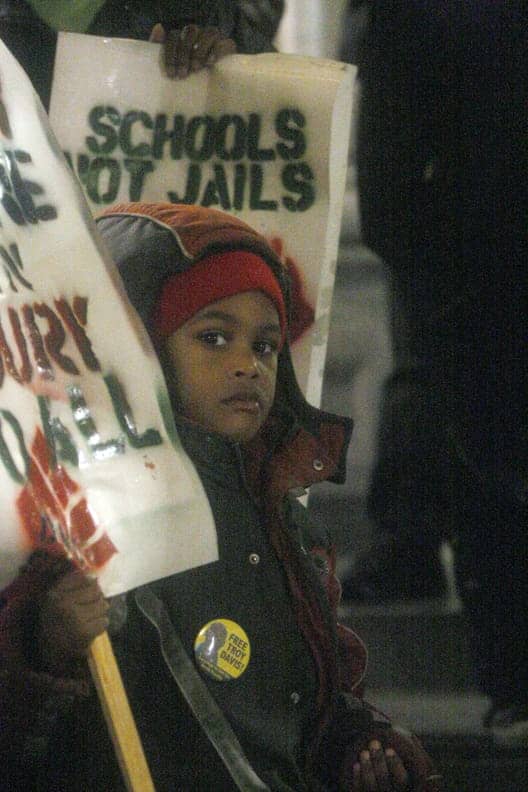Georgia-Prisoners-Strike-Oakland-protest-child-with-sign-at-City-Hall-121719-by-Malaika, Ride it ‘til the wheels fall off …, Abolition Now! 
