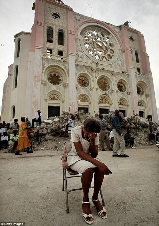 Haiti-earthquake-anniversary-mourning-at-National-Cathedral-011211-by-Getty-Images, One year ago the city collapsed, World News & Views 