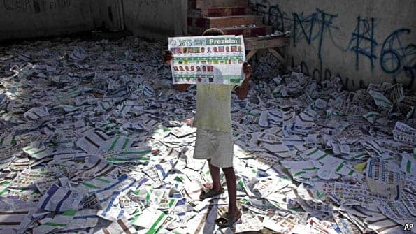 Haiti-election-ballots-on-ground-112810-by-AP, Haiti’s election farce backfires, World News & Views 