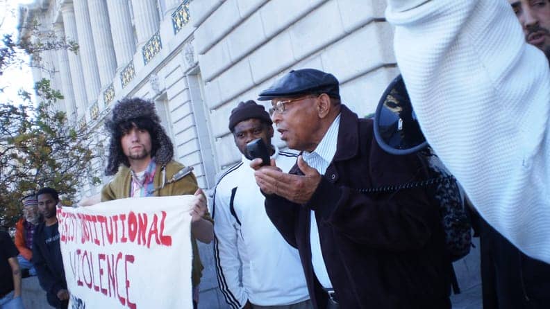 Willie-Ratcliff-invites-stories-on-police-brutality-at-Stop-SFPD-Terror-rally-011711-by-Carol-Harvey1, Why did SFPD shoot Randal Dunklin in his wheelchair?, Local News & Views 