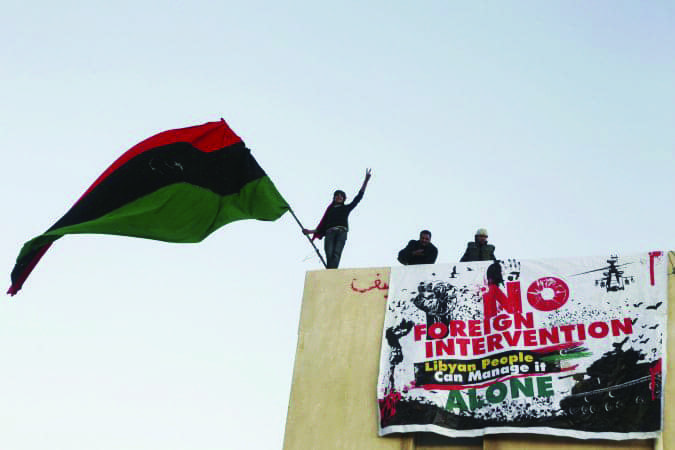 Libya-no-foreign-invasion-banner-in-Benghazi-022811-by-Al-Jazeera, Cynthia McKinney on President Obama and Libya, Japan and 9/11 truth, World News & Views 