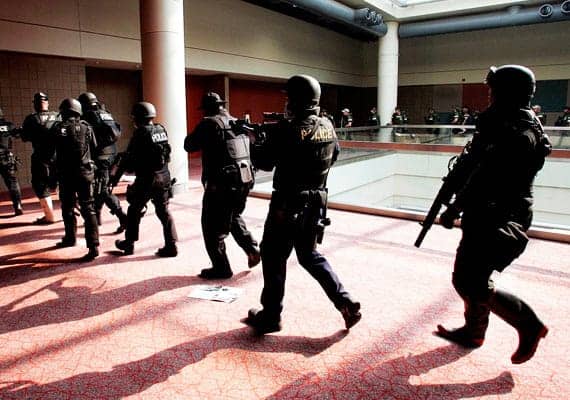 NOPD-SWAT-searches-Convention-Center-090505-by-Alex-Brandon-Times-Picayune, Judge hands out tough sentences in post-Katrina killing by police, News & Views 