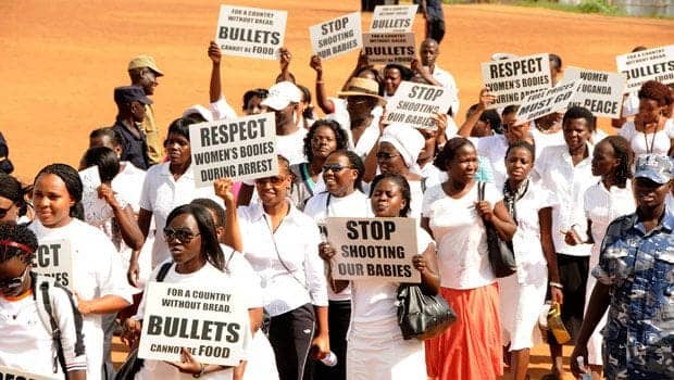 Ugandan-women-walk-to-work-to-protest-high-food-fuel-prices-050911-by-AP1, Respect the rights of all Ugandans, including LGBTI Ugandans, World News & Views 