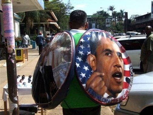 Kenyan-vendor-sells-Obama-wheel-covers-on-Oginga-Odinga-St.-Kisumu-Kenya-011909-by-Fred-Ooko-AP, Open Letter from an African to American President Barack Obama on the war in Libya, World News & Views 