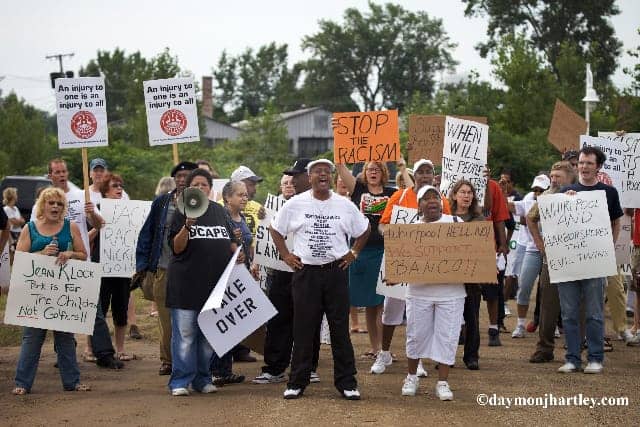 Rev.-Pinkney-leads-march-protesting-golf-course-opening-at-Jean-Klock-Park-081010-by-Daymon-Hartley, Michigan citizens take emergency manager law to court citing unconstitutional power grab, News & Views 
