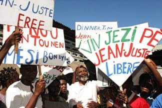 Jean-Juste-release-from-prison-2004, Is Haiti’s church hierarchy failing in its mission? Bishop Louis Kébreau’s immoral advice to Martelly, World News & Views 