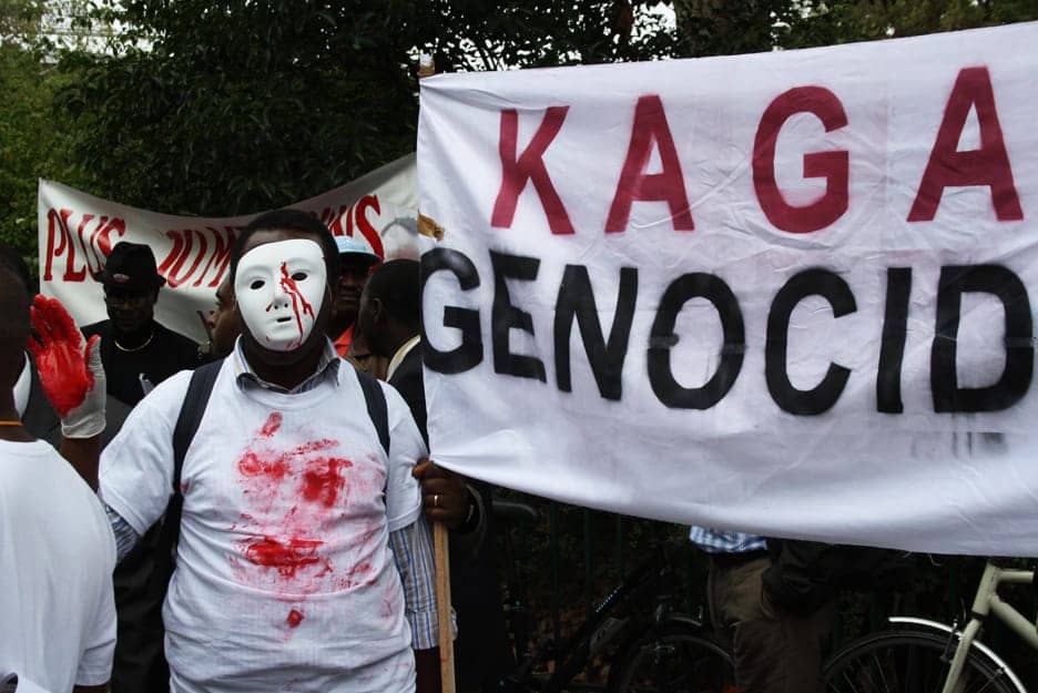 Anti-Kagame-protest-Kagame-Genocidaire-Paris-091211, Obama requests immunity for Kagame re Rwanda Genocide and Congo wars, World News & Views 