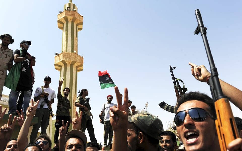 Libyan-rebels-fire-weapons-in-air-0911-by-Francisco-Leong-AFP, Walter Fauntroy, feared dead in Libya, returns home – Guess who he saw doing the killing, World News & Views 