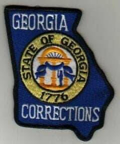 Georgia-Dept-of-Corrections-patch, Georgia retaliates against prison striker, now on hunger strike, Behind Enemy Lines 