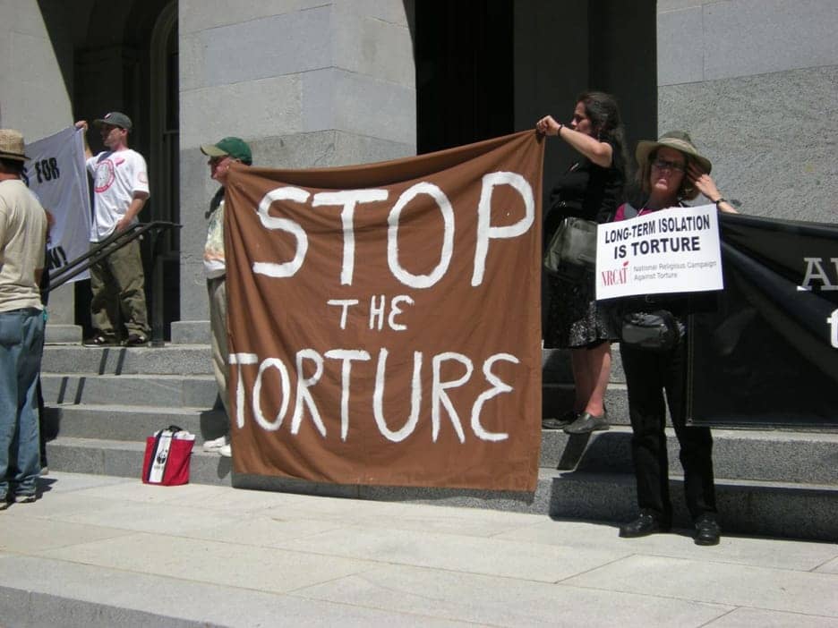 Rally-sign-Stop-the-torture-for-Ammiano-SHU-hearing-082311, We dare to win: The reality and impact of SHU torture units, Behind Enemy Lines 