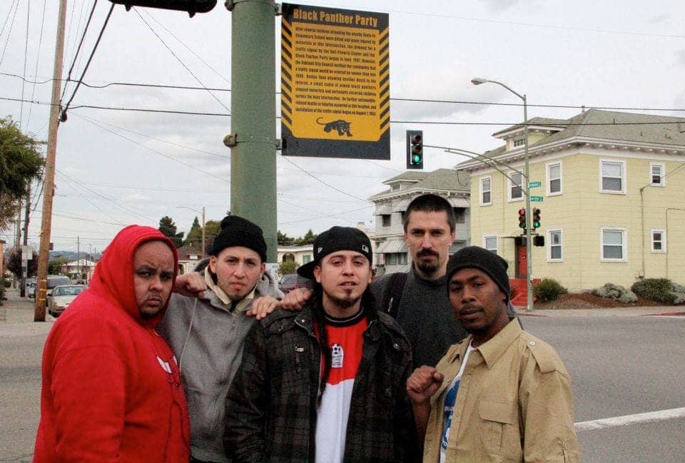 Dj-Illinoiz-G1-Rodstarz-JR-at-55th-Market-No.-Oakland-Black-Panthers’-stoplight-on-Rebel-Diaz’-OccupytheAirwaves-Tour-1111, Occupy the Airwaves: an interview wit’ the rap group Rebel Diaz, Culture Currents 