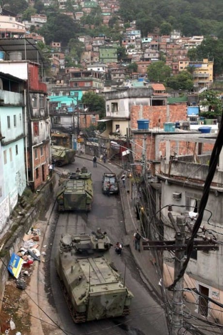 MINUSTAH-Brazilian-Navy-armored-vehicles-occupy-Rochina-favela-111311-by-Marcelo-Sayao-EPA, What happens in Haiti doesn’t stay in Haiti, World News & Views 