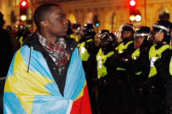 Congolese-protesting-election-police-in-London-121411-by-Luke-MacGregor-Reuters, Congolese will decide the fate of Congo, World News & Views 