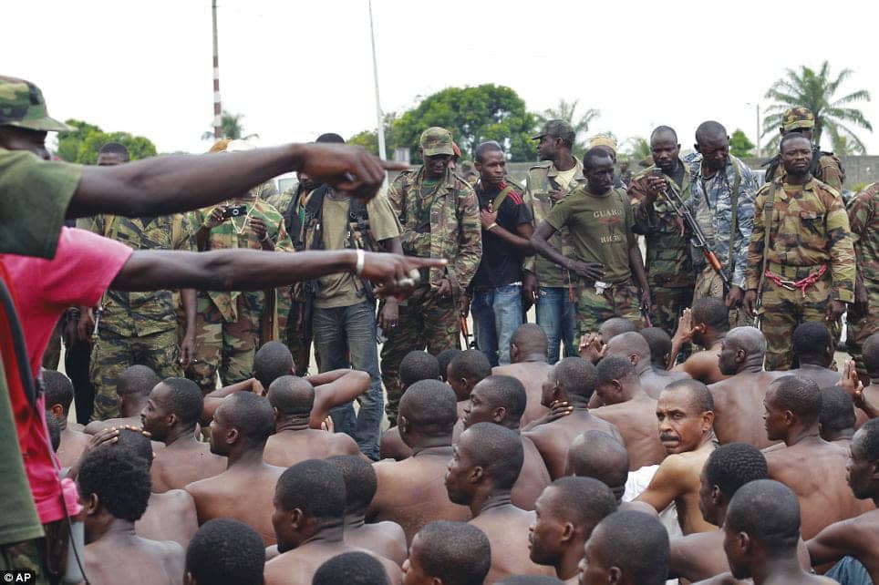 Ivory-Coast-Gbagbo-soldiers-captured-by-Ouattaras-Abidjan-0311-by-AP, Stop the wicked West! Out of the killing fields in Ivory Coast and Libya comes a new world order, World News & Views 