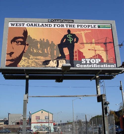 Just-Cause-billboard-West-Oakland-for-the-people-Stop-gentrification-2007-by-Favianna-Rodriguez, Nonprofit housers mourn demise of redevelopment agencies, Local News & Views 