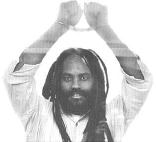 Mumia-handcuffed-hands-raised, The Prison, Abolition Now! 