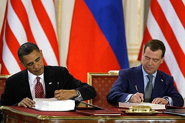 Obama-Russian-President-Dmitry-Medvedev-sign-‘New-START’-treaty-at-Prague-Castle-Prague-Czech-Republic-041810-by-Mikhail-Metzel-AP, Stop the wicked West! Out of the killing fields in Ivory Coast and Libya comes a new world order, World News & Views 