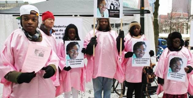 Rwandan-supporters-of-Victoire-all-political-prisoners-wearing-prison-pink-rally-outside-Dutch-Parliament-The-Hague-0212, Rwandan President Paul Kagame’s war on journalists, World News & Views 