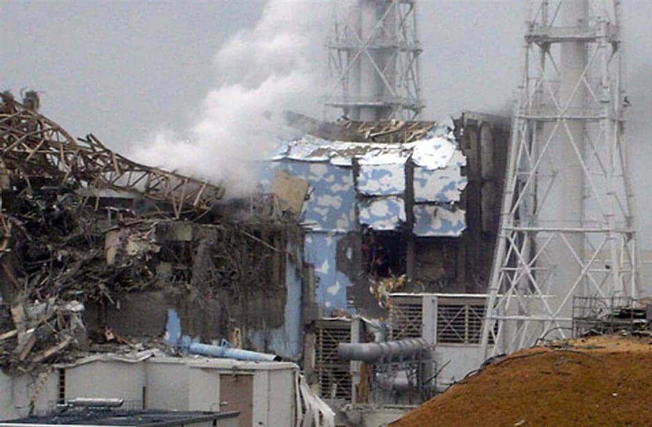 Fukushima-Reactors-3-left-4-exploded-031511-by-Suvendrini-Kakuchi, Japan’s ‘Throwaway People’ and the fallout from Fukushima, World News & Views 