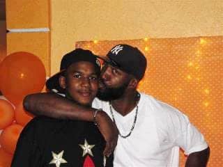 Trayvon-Tracy-Martin-dad-kisses-son1, Youth of color: Watched and shot, News & Views 