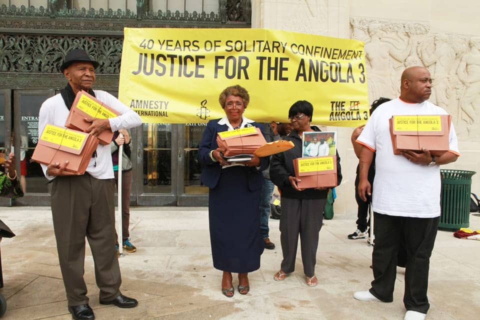 AI_Angola_3_deliver_petition_signed_by_67000_in_125_countries_to_Gov._Jindal_R.King_on_left_041712_by_A32, Angola 3: Time for justice is now!, Behind Enemy Lines 