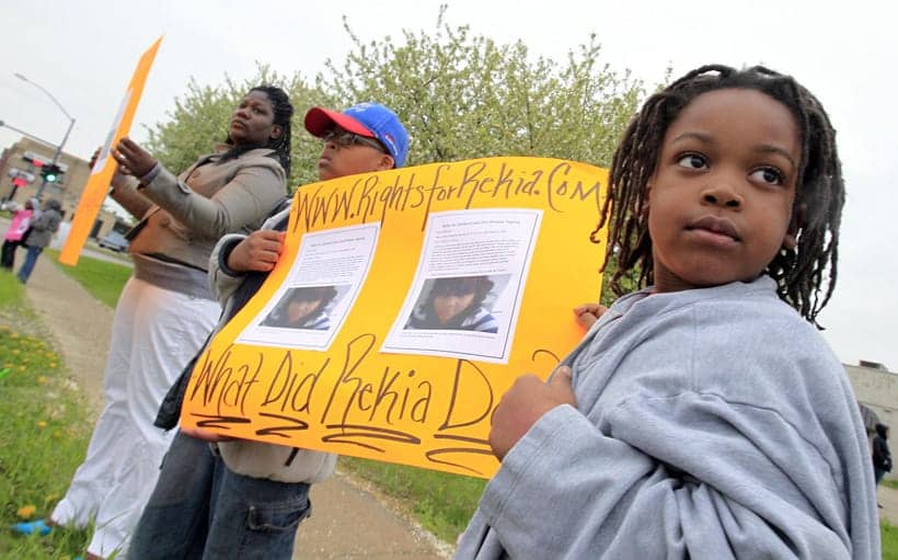 Rekia-Boyds-Chicago-PD-murder-protested-by-her-nephews-Omarr-Hatcher-9-Darian-Boyd-7-040712-by-Jim-Slosiarek-KCRG, A police lynching happens every 36 hours, News & Views 