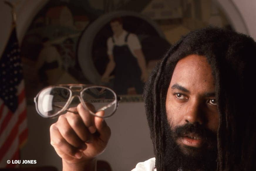 Mumia_1991_SCI_Huntingdon_death_row_by_c_Lou_Jones_web, Mumia, the long distance revolutionary: an interview wit’ documentary producers Stephen Vittoria and Noelle Hanrahan, Culture Currents 
