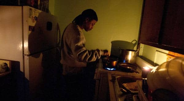 Hurricane-Sandy-Red-Hook-Houses-Brooklyn-Richard-Bates-cooks-110212-by-Ruth-Fremson-NYT, For public housing residents after Sandy, ‘a slow-motion Katrina’, News & Views 