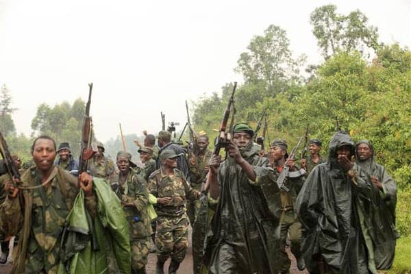 M23-rebels-celebrate-routing-govt-troops-from-town-near-Goma-072812-by-James-Akena-Reuters, UK Parliament: Is budget support providing Kagame cover in Congo and Rwanda?, World News & Views 