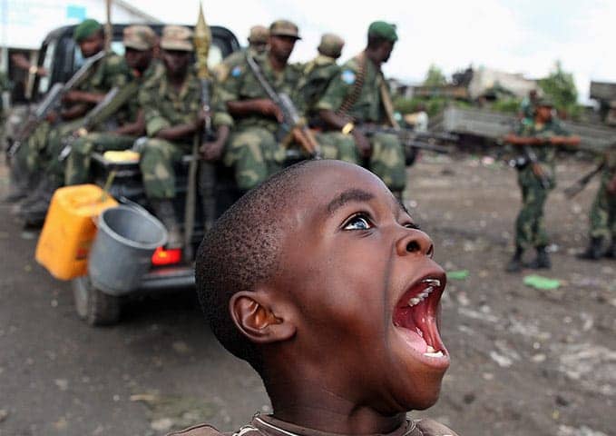 Boy-celebrates-Congo-govt-troops-return-to-Goma-121012-by-Goran-Tomasevic-Reuters, Congo, AFRICOM and the U.S. Corporate Council on Africa, World News & Views 