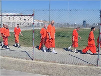 North-Kern-State-Prison-prisoners-walk-along-fence-line, Report from North Kern: Progress and chaos on the road to liberation, Behind Enemy Lines 