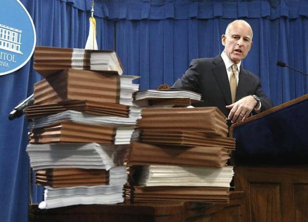Gov.-Jerry-Brown-points-to-prison-reports-declares-prison-overcrowding-ended-by-Rich-Pedroncelli-AP, Gov. Brown tries to justify unconstitutional prison overcrowding, backslides on Corrections budget, Abolition Now! 
