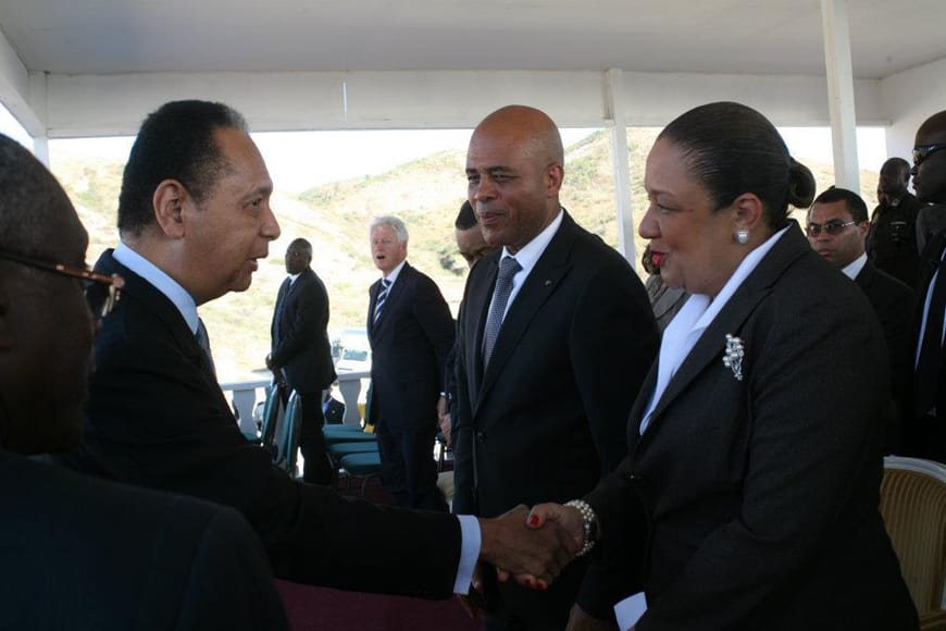 Haiti-President-Michel-Martelly-wife-greet-Jean-Claude-Duvalier-at-Titanyen-earthquake-commemoration-ceremony-011212-by, UPDATE: Haitians protect Aristide from attack on Lavalas, World News & Views 