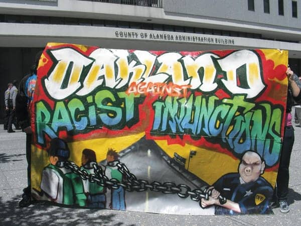 Oakland-against-racist-injunctions-banner-042210-by-JBP-Indybay, No Bratton-style policing in Oakland: Unraveling the fraying edges of zero tolerance, Local News & Views 