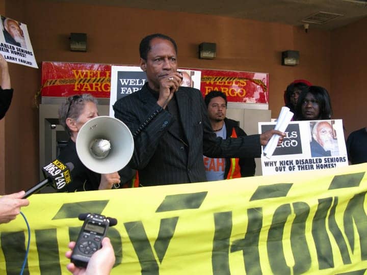 Occupy-Our-Homes-protest-Archbishop-Franzo-King-speaking-BVHP-Wells-Fargo-120612, ‘California in Crisis’ details Wells Fargo’s damage to California’s communities of color, Local News & Views 