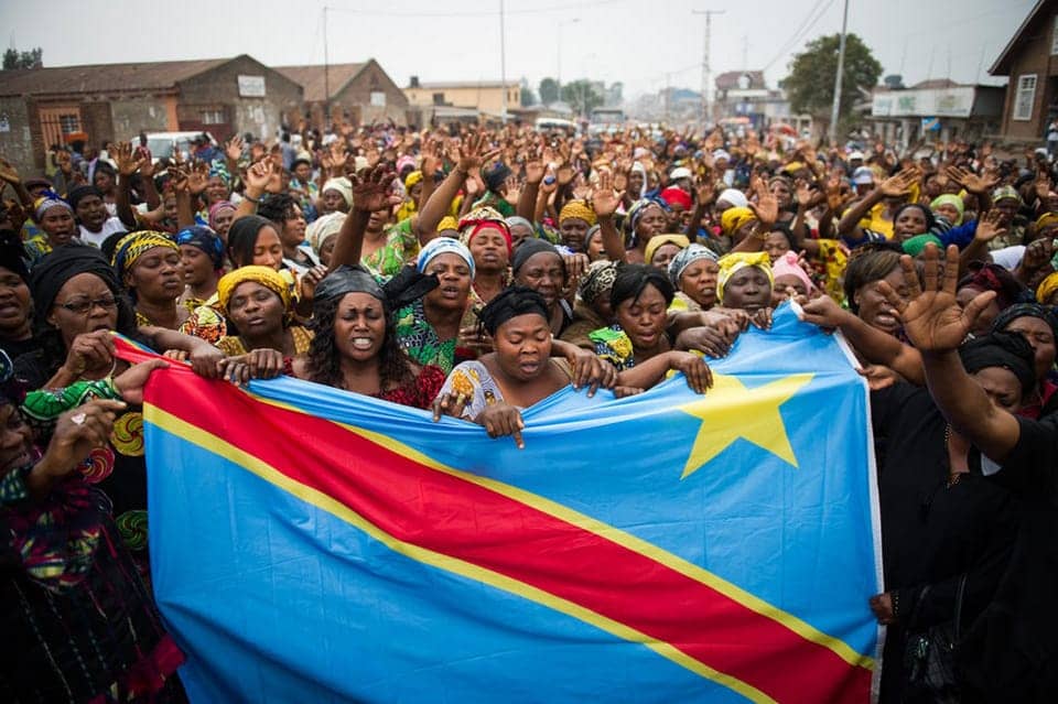 Women-in-Goma-eastern-Congo-rally-pray-for-peace-outside-Katinde-Nazareen-Church-080112-by-Phil-Moore-Getty, Women of the Congo decry U.S. neocolonialism, World News & Views 