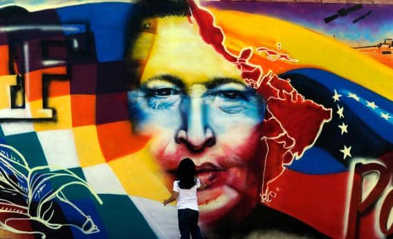 Hugo-Chavez-mural-Caracas-w-child-032813-by-Juan-Barreto-AFP, So much is at stake in Venezuela’s presidential election, World News & Views 