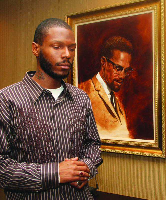 Malcolm-Shabazz-with-Malcolm-X-portrait-at-LA-Sentinel-0710-by-LA-Sentinel-web, Remembering young Malcolm – with love, News & Views 