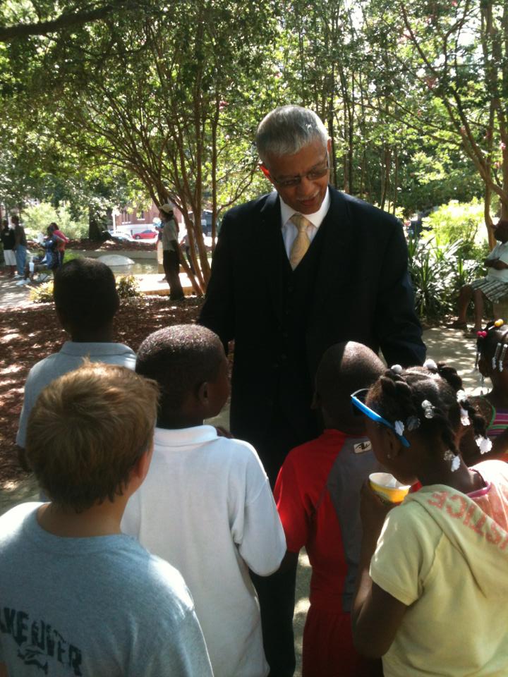Mayor-elect-Chokwe-Lumumba-with-children-in-park-at-pre-inaugural-block-party, Mayor Chokwe Lumumba and the Congolese people, World News & Views 