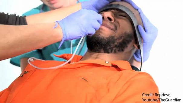 Yasiin-Bey-Mos-Def-force-fed-070813-by-Reprieve-The-Guardian, Yasiin Bey (Mos Def) force-feeding video launches campaign to support Guantanamo hunger strikers, World News & Views 