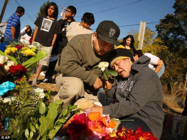 Parents-Rodrigo-Lopez-Sujey-Annel-Cruz-Cazere-of-Andy-Lopez-13-murdered-by-Sonoma-Cty-sheriff’s-deputies-Santa-Rosa-102313-by-AP, Justice for Andy Lopez, 13: A child is dead at the hands of Sonoma County sheriff’s deputies, Local News & Views 