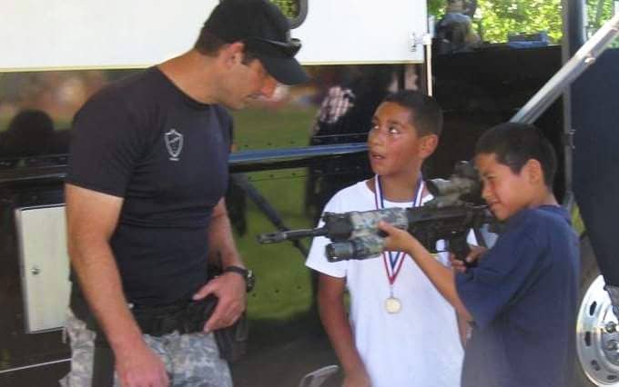 Santa-Rosa-SWAT-gun-booth-for-children-MLK-Park-festival-0811-by-Attila-Nagy, Justice for Andy Lopez, 13: A child is dead at the hands of Sonoma County sheriff’s deputies, Local News & Views 