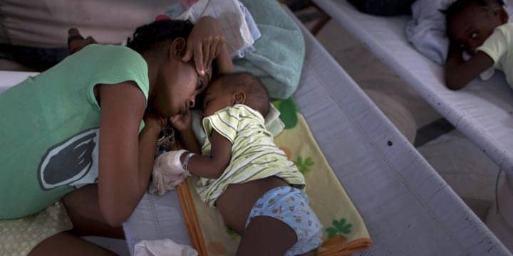 Haiti-mother-baby-cholera-by-AP-web, Cholera spreads beyond Haiti as Mexico suffers devastating floods, World News & Views 