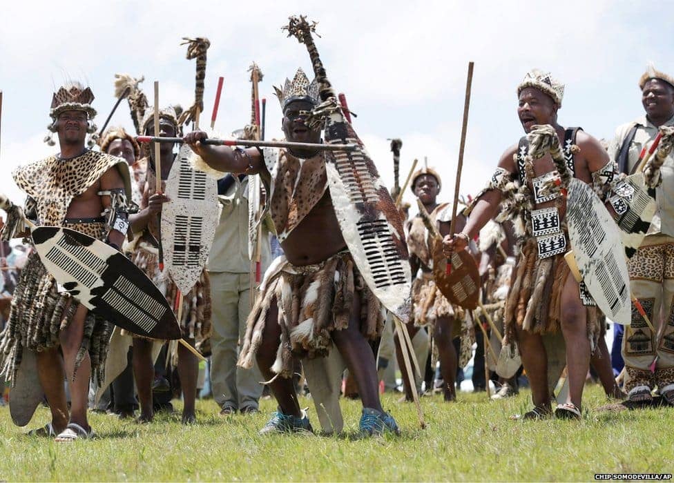 Zulu-men-perform-traditional-dance-on-hill-overlooking-Qunu-during-Mandela-state-funeral-121513-by-Chip-Somodevilla-AP, Mandela, sanitized, World News & Views 